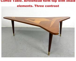 Lot 1480 Italian style Modernist Inlaid Coffee Table. Arrowhead form top with inlaid elements. Three contrast