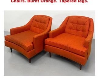Lot 1601 Pair Mid Century Modern Lounge Chairs. Burnt Orange. Tapered legs. 