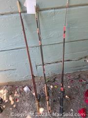wcollection of three fishing poles3351 t