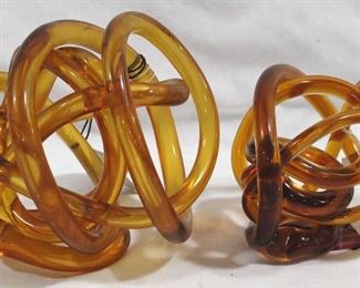 3328 - Pair of Orange Three Hands Glass Sculptures 6" round & 5" round
