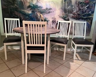 Round kitchen table with matching chairs (4) - $280