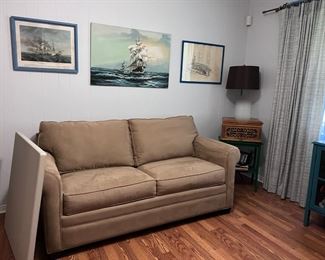 sofa, wall decor, curtains, lamp