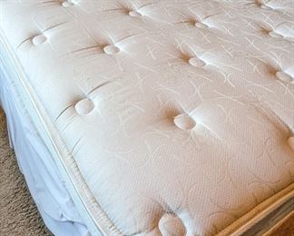 full-sized plush mattress