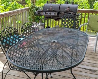 Iron patio set with 4 chairs