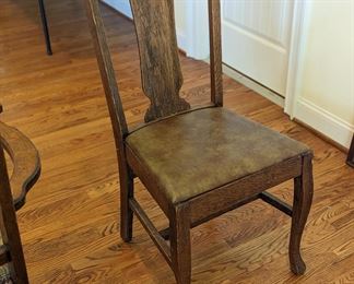 Antique wood and leather chair