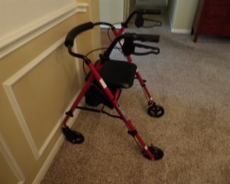 Walker with seat and wheels