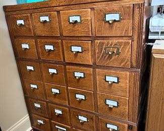 Antique German oak apothecary cabinet