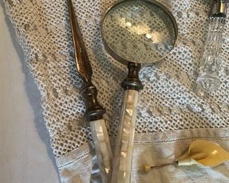 Vintage mother of pearl magnifying glass and letter opener