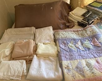 Lace curtains & quilts