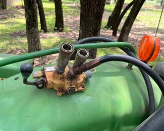 John Deere 850 tractor with front end loader and box blade; runs with jump start