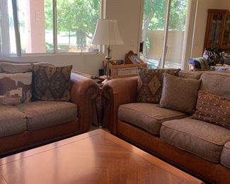 Leather and fabric couch and love seat