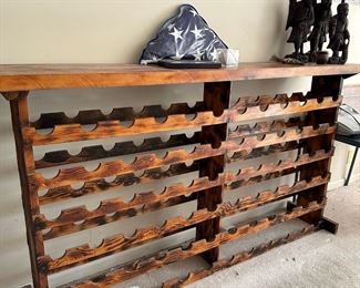 Item 13 - Large Wine / bottle rack / holds 72 bottles of wine. Does not include the accessories on top of it. - $150
