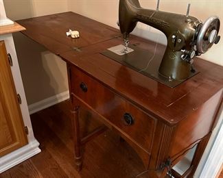 Item 25 - Westinghouse Sewing machine in Cabinet - $45