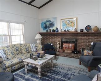 sofa, rug, farmhouse coffee table and end tables, pottery, artwork by Hutto and Ragland