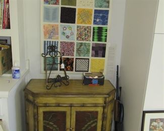 Oriental cabinet, bb guns, Dooley print, textile art