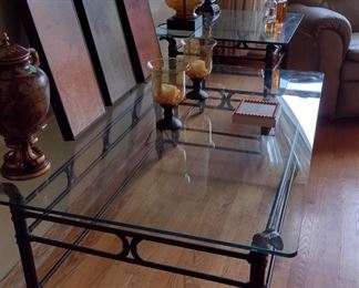 Gorgeous industrial steampunk coffee table and two end tables. Tempered thick glass. Corners are rounded.