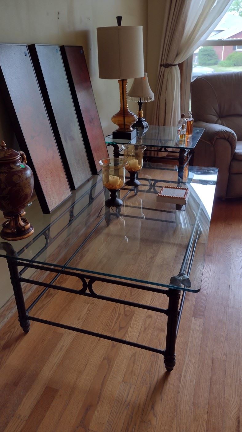 Gorgeous industrial steampunk coffee table and two end tables. Tempered thick glass. Corners are rounded.