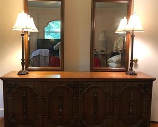 Bedroom furniture from Bassett-dresser with 6 drawers & double mirrors that can swing to clean under them.   Pair of tall lamps.