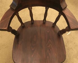 Furniture- solid wood chair with curved wood back.
