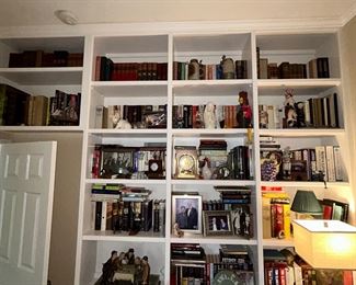 Many different books and collectibles 