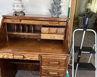 S curve roll top (newer), Cosco step stool on the right along with a Shark sweeper.