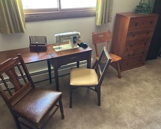 NewHome sewing machine, various chairs and a 5 drawer pine dresser.