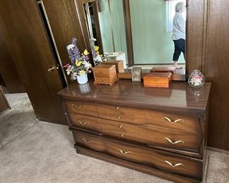 Another multi drawer dresser w/ mirror.