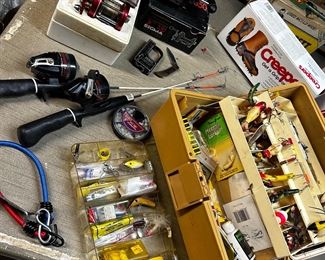 Fishing poles, reels, lots of tackle and accessories