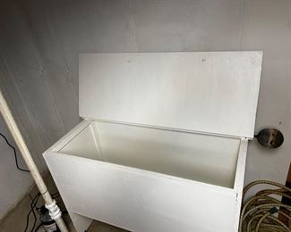 wood storage box about 5 feet wide