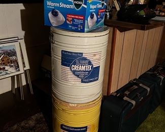 couple of large tins, steam vaporizer and one of the pcs of luggage 