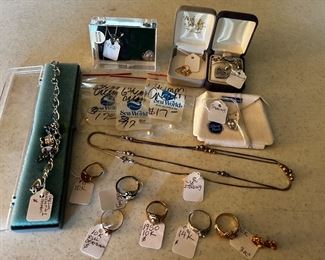 Various gold and Nead and it’s Sterling pieces including rings, necklaces, bracelets…