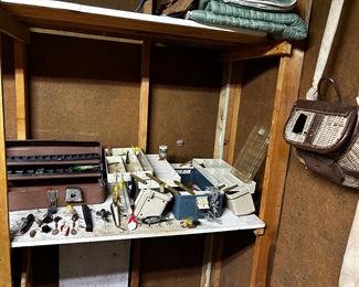 Tackle boxes and fishing lures, all sorts of fishing accessories, fishing creole on your right.