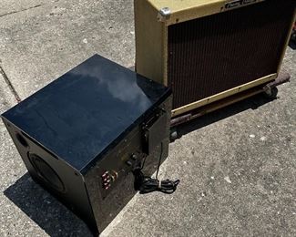 On the left - Mirage BPS 150 high current mosfet subwoofer amplifier. On the right - vintage PeaVey P1000dual speakers