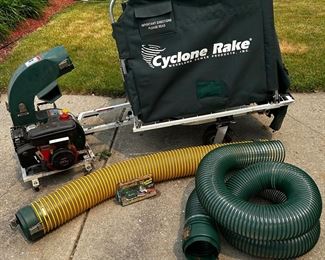 Cyclone rake mulcher and grass catcher w/ extra hose. (note the engine can easily detach from the unit)