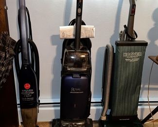 Left side - 2 speed Quik Broom Hoover middle - Royal pro series vacuum            right side -Hoover Liberty vacuum