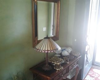 Entry way table and separate  mirror. 
Table lamp with  stained  glass shade