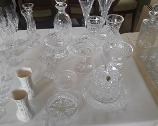 Waterford  crystal pieces 
Decanter,  flutes, serving pieces
Jar with lid
Belleck vases