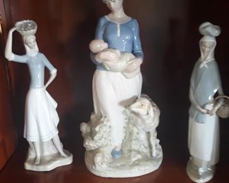 A few decorative  figurines  and some Lladro  figurines 