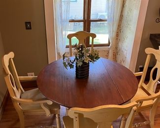 Dropleaf table with storage drawer in base and four chairs (Broyhill)