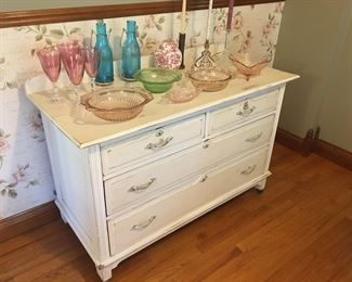 Linen chest of drawers, depression glass (pink, green), Johnson Brothers ginger jar, blue glass tea light candle holders, pink glass candle sticks, clear glass candle sticks