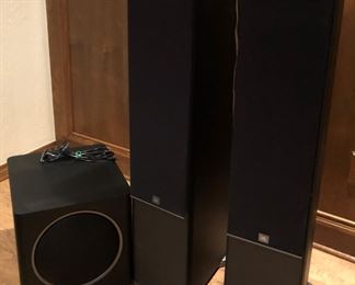 2 JBL tower speakers and a subwoofer