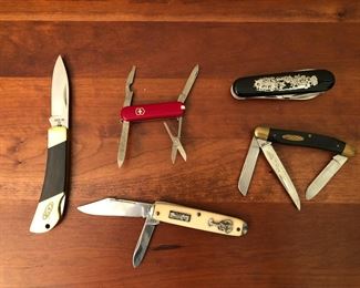 pocket knives (shows Case XX - never used, as well as the Swiss Collectors item, and several others