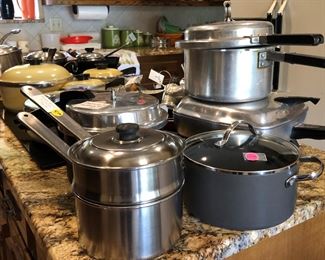 variety of pots and pans, pressure cookers, etc.