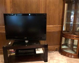 Phillips Flat Screen TV, stand, and DVD player