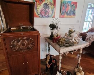 Phonograph, antique fan, table, crosses knick knacks