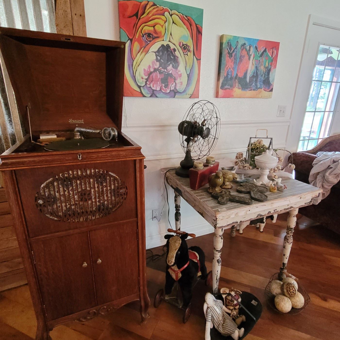 Phonograph, antique fan, table, crosses knick knacks