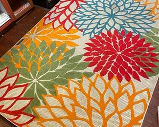$50.  Needs spot cleaning.  Bright colorful indoor outdoor rug 
