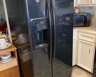 Maytag side by side black refrigerator