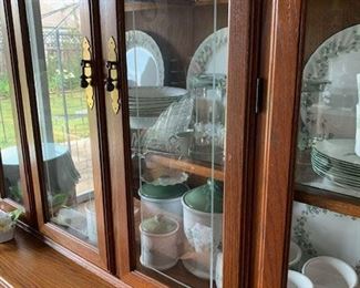Very nice china cabinet, and a nice matching set of Corelle.