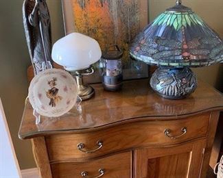 This beautiful piece may be sold to a family member, but you never know!  Check out that dragonfly lamp!  And the white lamp is a touch lamp.